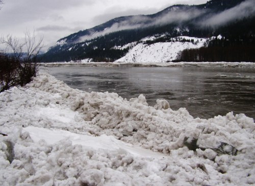 January 2, 2014. Same spot as the idyllic picture at the top of the post, a short two days later, after the water has flooded the banks and receded, leaving much ice behind.