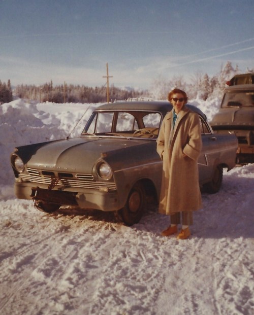Mom in 1962, moving to the Cariboo region of British Columbia from central California. She drove up in her beloved Taunus car, Dad's truck is loaded with her furniture and household treasures, and, yes, many boxes of books. I love this picture, especially the totally unsuitable footwear. Mom never did really resign herself to wearing proper winter boots; I swear her feet were cold for the next 50 years!
