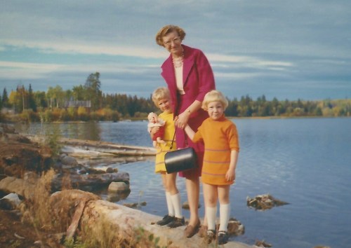 And a few years later, now with children in tow. This looks like we're going Sunday visiting; all dressed up. I'm the one in orange; check out the homemade haircut!
