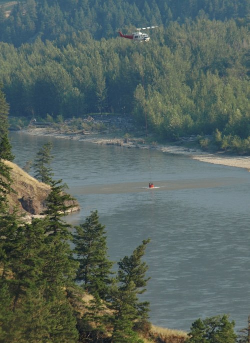 After the bombers left to refill their tanks, the helicopters took over, targetting hot spots.