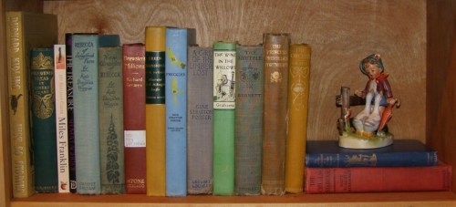 And here they are - the first decade books, minus (The Wonderful Adventures of) Nils, who is unaccountably missing (maybe off on another adventure?) and is represented by the pseudo-Hummel boy-with-geese.