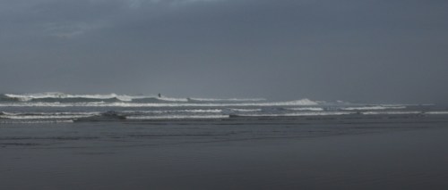 Finally the waves subside enough for some surfer action. This brave soul was up a few times, but never for long. Hard work for a few moments of catching the wave!