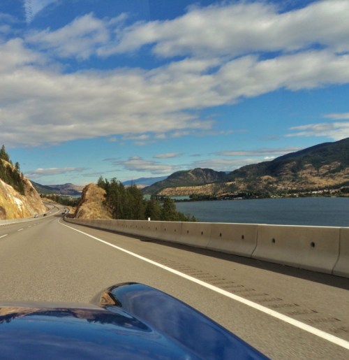 One of my favourite views - looking out over the Spitfire bonnet. The only better place is behind the wheel! Here we are heading towards Vernon, B.C., on Day 1 of a vintage car rally we participated in September 19-21.