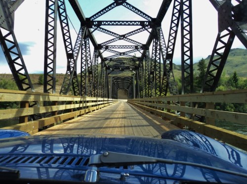 The road beckons! Looking down the bonnet of the Little Blue Car.