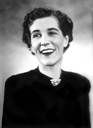 She's smiling! A wonderful and rare photo of Georgette Heyer looking downright happy, her actual state much of the time when not being pinned down by publicity people.